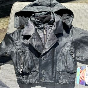 Brand new kids, extra small leather jacket, insulated with removable hood.